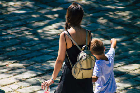 Seville Spain September 04, 2021 Pedestrians walking in the street during the coronavirus outbreak hitting Spain, wearing a mask is not mandatory but most of people wear itのeditorial素材