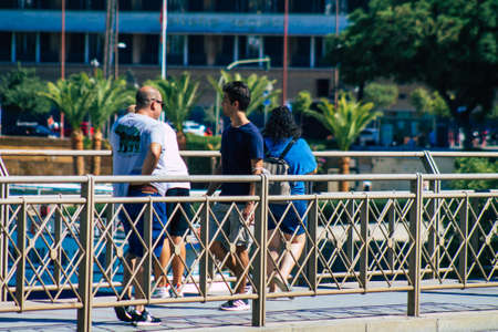 Seville Spain September 04, 2021 Pedestrians walking in the street during the coronavirus outbreak hitting Spain, wearing a mask is not mandatory but most of people wear itのeditorial素材