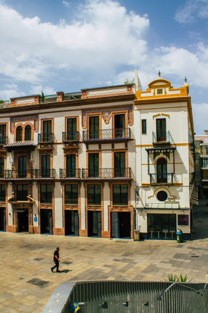 Seville Spain August 10, 2021 Facade of a building in the streets of Seville, an emblematic city and the capital of the region of Andalusia, in the south of Spainのeditorial素材