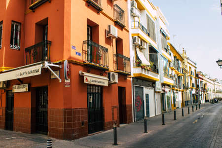 Seville Spain August 10, 2021 Facade of a building in the streets of Seville, an emblematic city and the capital of the region of Andalusia, in the south of Spainのeditorial素材