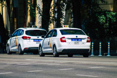 Seville Spain September 04, 2021 Taxi driving through the streets of Seville during the coronavirus...