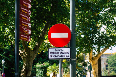 Seville Spain September 22, 2021 Street sign or road sign, erected at the side of or above roads to provide information to road user in the downtown area of Sevilleの写真素材