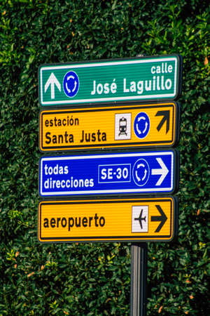 Seville Spain September 22, 2021 Street sign or road sign, erected at the side of or above roads to provide information to road user in the downtown area of Sevilleの写真素材