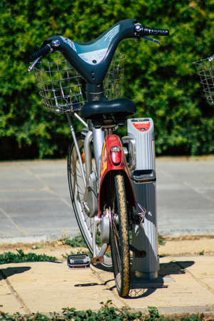 Seville Spain September 22, 2021 Accessible bicycles to hire for short periods of time, usually for a few hours parked in the street and part of the public transport system of Sevilleの写真素材