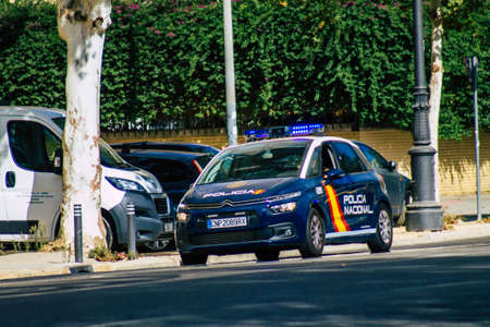 Seville Spain September 15, 2021 Police car patrolling in the streets of Seville during the coronavirus outbreak hitting Spain, wearing a mask in the street is not mandatoryのeditorial素材