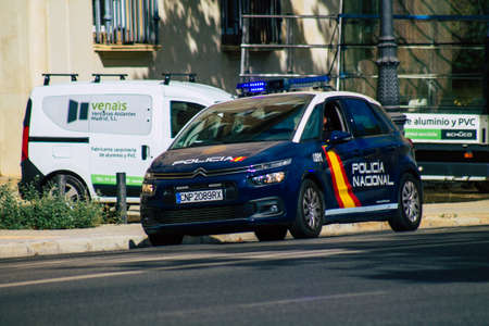 Seville Spain September 15, 2021 Police car patrolling in the streets of Seville during the coronavirus outbreak hitting Spain, wearing a mask in the street is not mandatoryのeditorial素材
