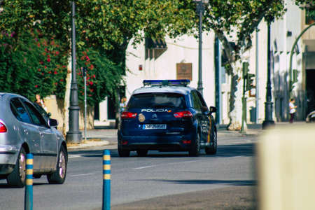 Seville Spain September 15, 2021 Modern electric tram for passengers rolling through the streets of Seville during the coronavirus outbreak hitting Spain, wearing a mask is mandatoryのeditorial素材