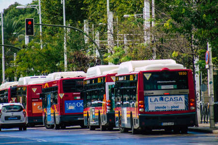 Seville Spain September 15, 2021 Bus driving through the streets of Seville during the coronavirus outbreak hitting Spain, wearing a mask is mandatoryのeditorial素材