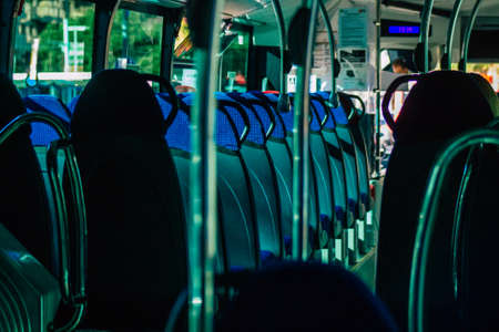 Seville Spain September 15, 2021 Inside a city bus driving through the streets of Seville during the coronavirus outbreak hitting Spain, wearing a mask is mandatoryのeditorial素材
