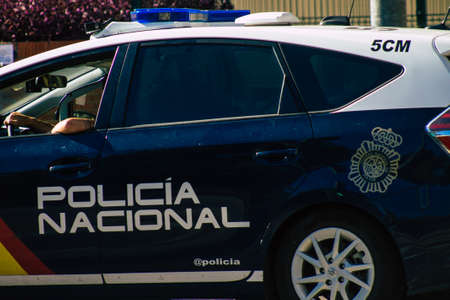 Seville Spain September 18, 2021 Police car patrolling in the streets of Seville during the coronavirus outbreak hitting Spain, wearing a mask in the street is not mandatoryのeditorial素材