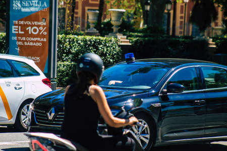 Seville Spain September 18, 2021 Police car patrolling in the streets of Seville during the coronavirus outbreak hitting Spain, wearing a mask in the street is not mandatoryのeditorial素材