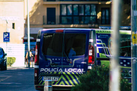 Seville Spain September 18, 2021 Police car patrolling in the streets of Seville during the coronavirus outbreak hitting Spain, wearing a mask in the street is not mandatoryのeditorial素材