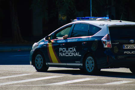 Seville Spain September 18, 2021 Police car patrolling in the streets of Seville during the coronavirus outbreak hitting Spain, wearing a mask in the street is not mandatoryのeditorial素材