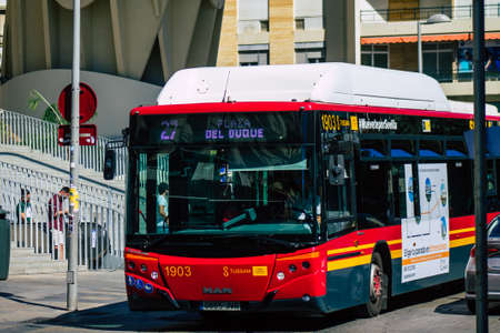 Seville Spain September 18, 2021 Bus driving through the streets of Seville during the coronavirus outbreak hitting Spain, wearing a mask is mandatoryのeditorial素材