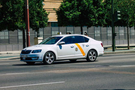 Seville Spain September 18, 2021 Taxi driving through the streets of Seville during the coronavirus outbreak hitting Spain, wearing a mask is mandatoryのeditorial素材