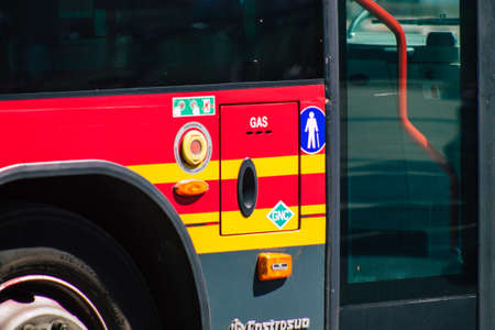 Seville Spain September 18, 2021 Bus driving through the streets of Seville during the coronavirus outbreak hitting Spain, wearing a mask is mandatoryのeditorial素材