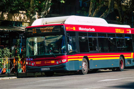 Seville Spain September 18, 2021 Bus driving through the streets of Seville during the coronavirus outbreak hitting Spain, wearing a mask is mandatoryのeditorial素材