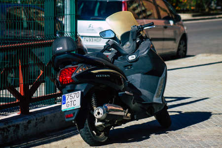 Seville Spain September 18, 2021 Motorcycles parked in the streets of Seville, an emblematic city and the capital of the region of Andalusia, in the south of Spainのeditorial素材