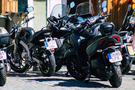 Seville Spain September 18, 2021 Motorcycles parked in the streets of Seville, an emblematic city and the capital of the region of Andalusia, in the south of Spainのeditorial素材