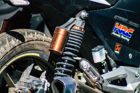 Seville Spain September 18, 2021 Motorcycles parked in the streets of Seville, an emblematic city and the capital of the region of Andalusia, in the south of Spainのeditorial素材