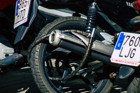 Seville Spain September 18, 2021 Motorcycles parked in the streets of Seville, an emblematic city and the capital of the region of Andalusia, in the south of Spainのeditorial素材