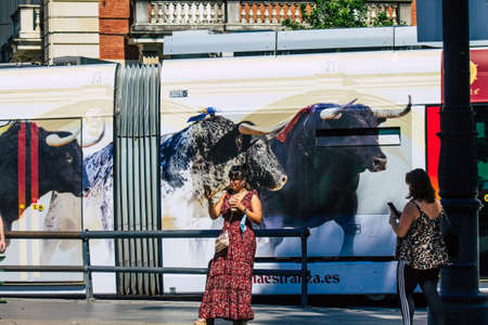 Seville Spain September 18, 2021 Modern electric tram for passengers rolling through the streets of Seville during the coronavirus outbreak hitting Spain, wearing a mask is mandatoryのeditorial素材