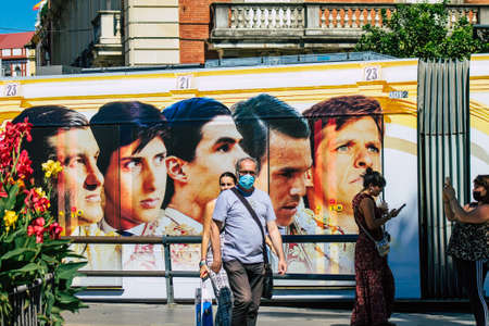 Seville Spain September 18, 2021 Modern electric tram for passengers rolling through the streets of Seville during the coronavirus outbreak hitting Spain, wearing a mask is mandatoryのeditorial素材