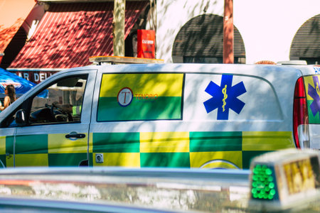 Seville Spain September 18, 2021 Ambulance driving through the streets of Seville during the coronavirus outbreak hitting Spain, wearing a mask is mandatoryのeditorial素材