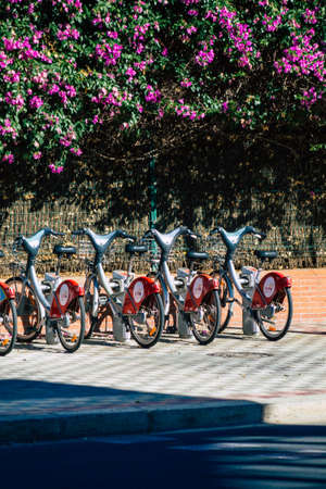 Seville Spain September 18, 2021 Accessible bicycles to hire for short periods of time, usually for a few hours parked in the street and part of the public transport system of Sevilleのeditorial素材