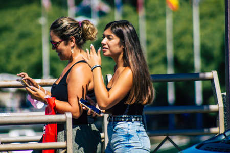 Seville Spain September 18, 2021 Pedestrians walking in the street during the coronavirus outbreak hitting Spain, wearing a mask is not mandatory but most of people wear itのeditorial素材