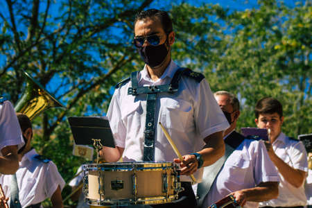 Carmona Spain September 26, 2021 Focus of members of a local music orchestra playing music in the streets of Carmona during the coronavirus epidemic hitting Spainのeditorial素材