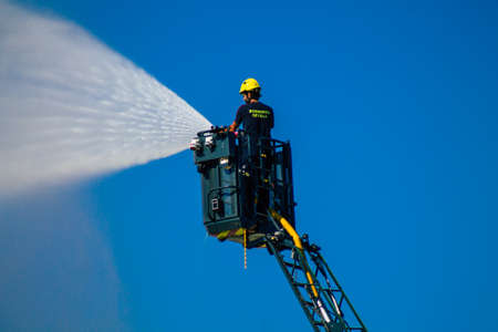 Seville Spain September 22, 2021 Seville firefighters training at the fire station during the coronavirus outbreak, they are training in the use of firefighting equipment under intervention conditionsのeditorial素材