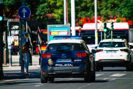 Seville Spain September 22, 2021 Police car patrolling in the streets of Seville during the coronavirus outbreak hitting Spain, wearing a mask in the street is not mandatoryのeditorial素材