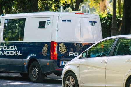 Seville Spain September 22, 2021 Police car patrolling in the streets of Seville during the coronavirus outbreak hitting Spain, wearing a mask in the street is not mandatoryのeditorial素材
