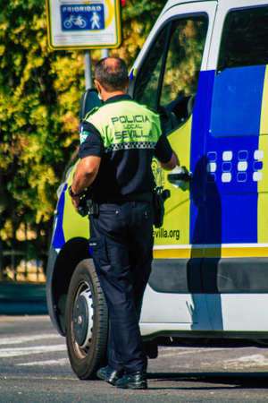 Seville Spain September 22, 2021 Police officer in the streets of Seville during the coronavirus outbreak hitting Spain, wearing a mask in the street is not mandatoryのeditorial素材