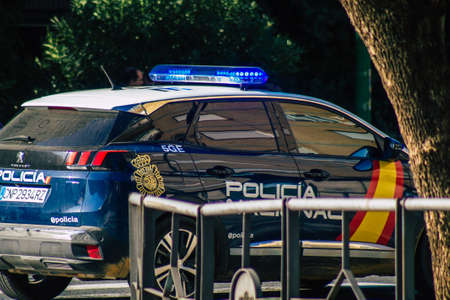 Seville Spain September 22, 2021 Police car patrolling in the streets of Seville during the coronavirus outbreak hitting Spain, wearing a mask in the street is not mandatoryのeditorial素材