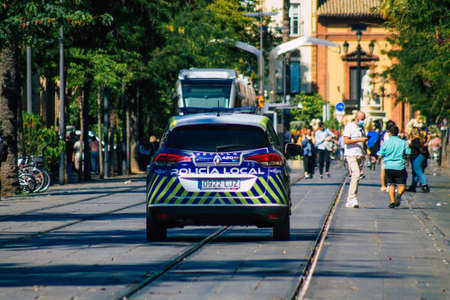 Seville Spain September 22, 2021 Police car patrolling in the streets of Seville during the coronavirus outbreak hitting Spain, wearing a mask in the street is not mandatoryのeditorial素材