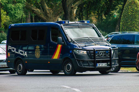 Seville Spain September 15, 2021 Police car patrolling in the streets of Seville during the coronavirus outbreak hitting Spain, wearing a mask in the street is not mandatoryのeditorial素材