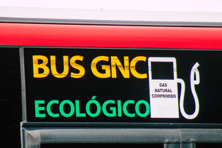 Seville Spain September 15, 2021 Bus driving through the streets of Seville during the coronavirus outbreak hitting Spain, wearing a mask is mandatoryのeditorial素材