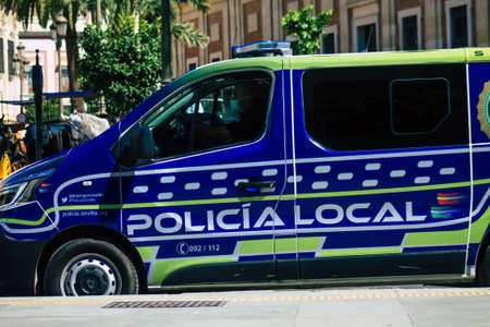 Seville Spain September 18, 2021 Police car patrolling in the streets of Seville during the coronavirus outbreak hitting Spain, wearing a mask in the street is not mandatoryのeditorial素材