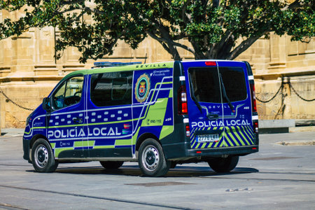 Seville Spain September 18, 2021 Police car patrolling in the streets of Seville during the coronavirus outbreak hitting Spain, wearing a mask in the street is not mandatoryのeditorial素材