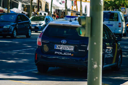 Seville Spain September 18, 2021 Police car patrolling in the streets of Seville during the coronavirus outbreak hitting Spain, wearing a mask in the street is not mandatoryのeditorial素材