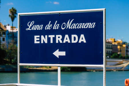 Seville Spain September 18, 2021 Tourist boats on the Guadalquivir River that crosses Seville, an emblematic city and the capital of the region of Andalusia, in the south of Spainのeditorial素材