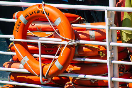 Seville Spain September 18, 2021 Tourist boats on the Guadalquivir River that crosses Seville, an emblematic city and the capital of the region of Andalusia, in the south of Spainのeditorial素材