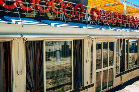 Seville Spain September 18, 2021 Tourist boats on the Guadalquivir River that crosses Seville, an emblematic city and the capital of the region of Andalusia, in the south of Spainのeditorial素材