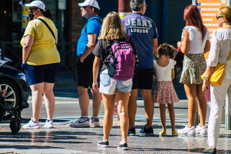 Seville Spain September 18, 2021 Pedestrians walking in the street during the coronavirus outbreak hitting Spain, wearing a mask is not mandatory but most of people wear itのeditorial素材