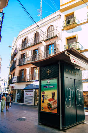 Seville Spain September 18, 2021 Pedestrians walking in the street during the coronavirus outbreak hitting Spain, wearing a mask is not mandatory but most of people wear itのeditorial素材
