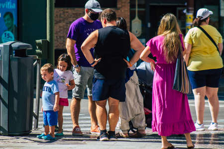 Seville Spain September 18, 2021 Pedestrians walking in the street during the coronavirus outbreak hitting Spain, wearing a mask is not mandatory but most of people wear itのeditorial素材