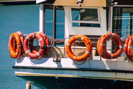 Seville Spain September 18, 2021 Tourist boats on the Guadalquivir River that crosses Seville, an emblematic city and the capital of the region of Andalusia, in the south of Spainのeditorial素材
