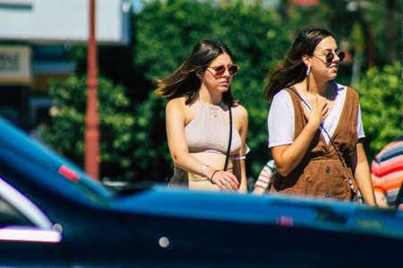 Seville Spain September 18, 2021 Pedestrians walking in the street during the coronavirus outbreak hitting Spain, wearing a mask is not mandatory but most of people wear itのeditorial素材
